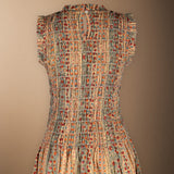 Robe Mikara beige à fleurs rouges
